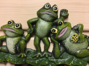 Coat rack with frogs